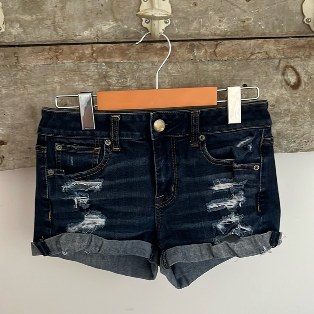 Distressed jean cut-offs
